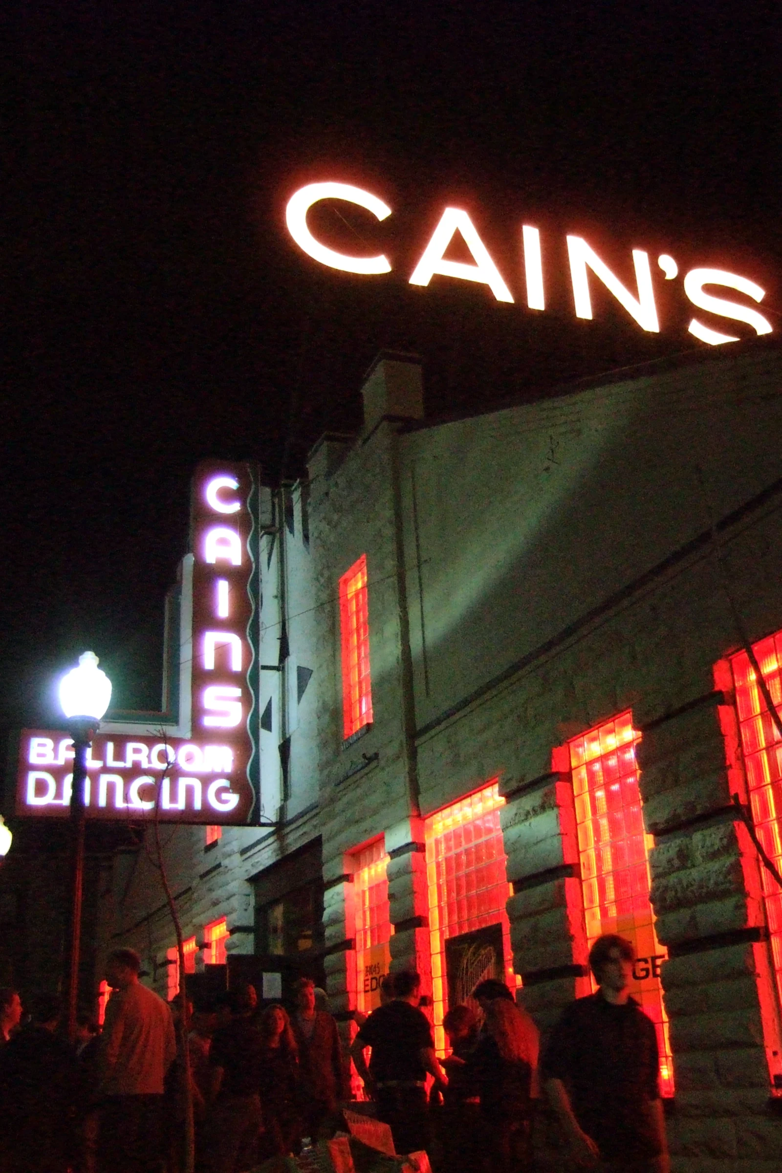 Historic Cain’s Ballroom neon sign and red-lit windows in 2006